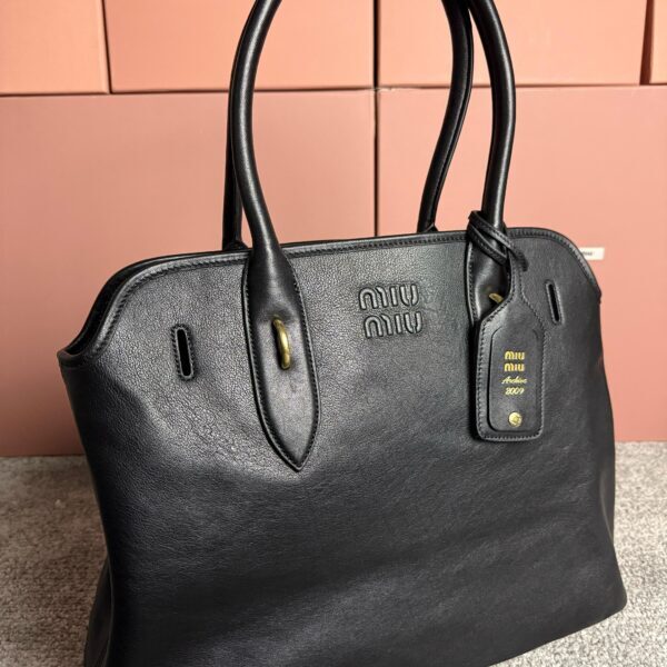 Miu Miu Aventure crna