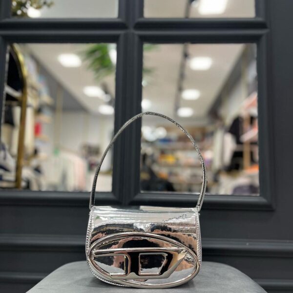 Diesel torbica srebrna