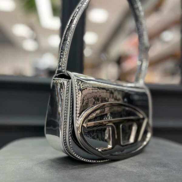 Diesel torbica srebrna