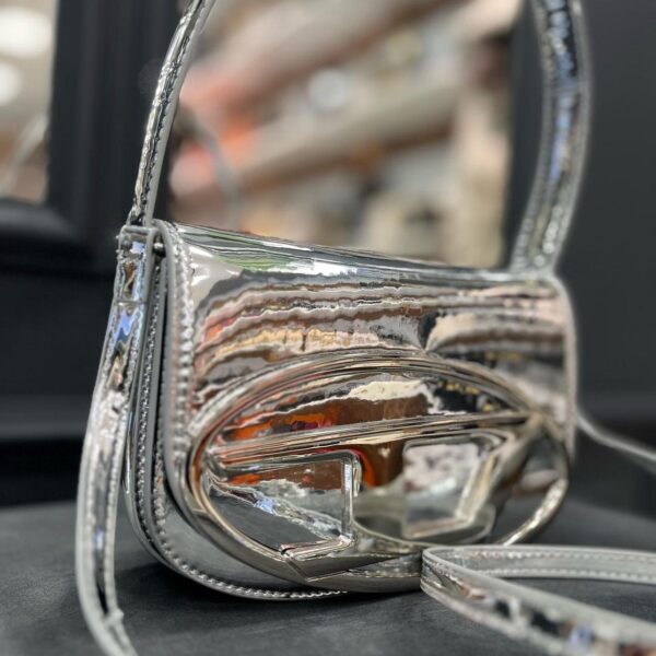 Diesel torbica srebrna